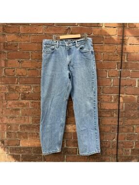 vintage Levi’s 555 made in USA light wash jeans 90s 34x30